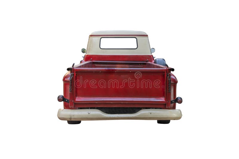 The back of a vintage red pickup truck,isolated on white background with clipping path. The back of a vintage red pickup truck,isolated on white background with clipping path.