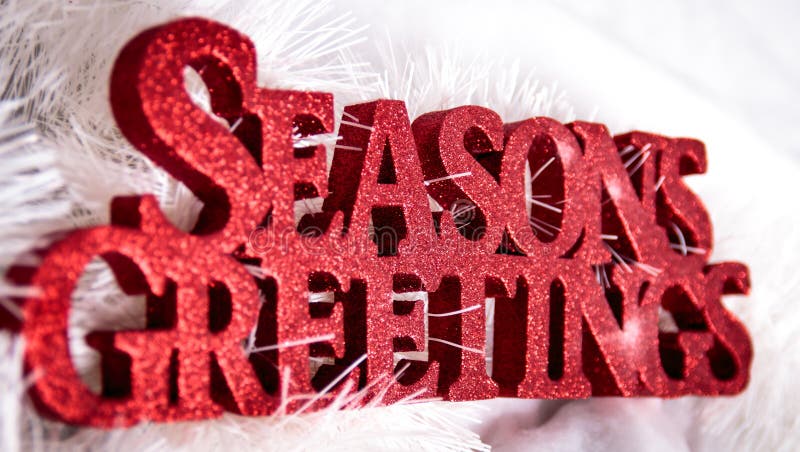 Il rosso condisce il segno di saluti per natale fotografie stock