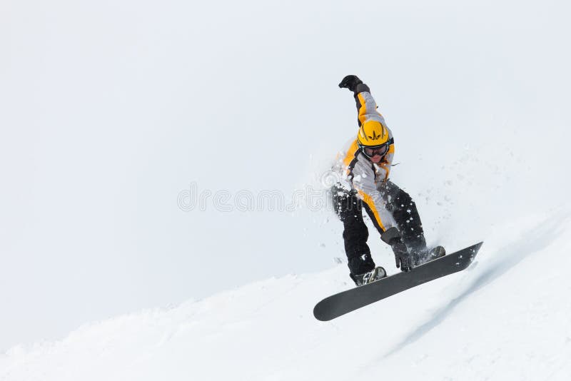 Il salto dello Snowboarder fotografie stock Il salto dello Snowboarder fotografie stock