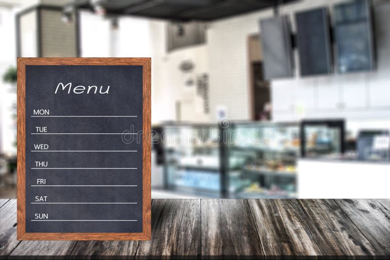 Wooden menu display sign, Frame restaurant message board on wooden table, Blurred image background, Template mock up for adding your design and leave space beside frame for adding more text. Wooden menu display sign, Frame restaurant message board on wooden table, Blurred image background, Template mock up for adding your design and leave space beside frame for adding more text.