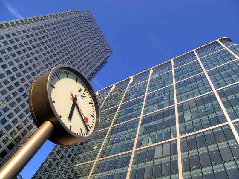 Il tempo è denaro in molo del canarino dei Docklands fotografie stock Il tempo è denaro in molo del canarino dei Docklands fotografie stock