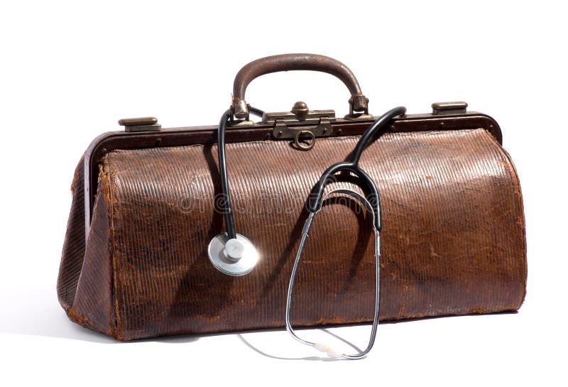 Il vecchio cuoio marrone aggiusta la borsa e lo stetoscopio immagini stock Il vecchio cuoio marrone aggiusta la borsa e lo stetoscopio immagini stock