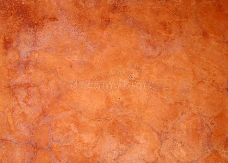 Il vecchio marrone arancio luminoso ha dipinto il fondo approssimativo incrinato macchiato sbiadito della parete del gesso immagine stock libera da diritti Il vecchio marrone arancio luminoso ha dipinto il fondo approssimativo incrinato macchiato sbiadito della parete del gesso immagine stock libera da diritti
