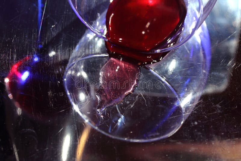 Dissonance. The bottled wine. The fallen glass. Blue color and red wine. Incongruous, unsuitable colors. Dissonance. The bottled wine. The fallen glass. Blue color and red wine. Incongruous, unsuitable colors.