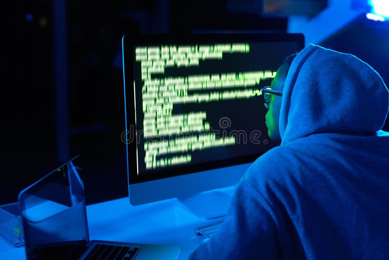Theres a hack to everything in life. a young male hacker cracking a computer code in the dark. Theres a hack to everything in life. a young male hacker cracking a computer code in the dark