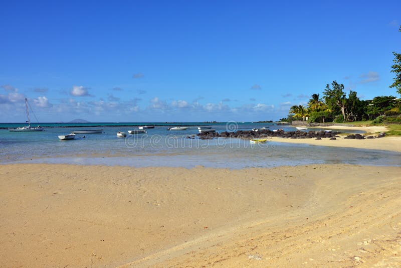 Beach and moored boats on the south coastline of Mauritius island. Beach and moored boats on the south coastline of Mauritius island