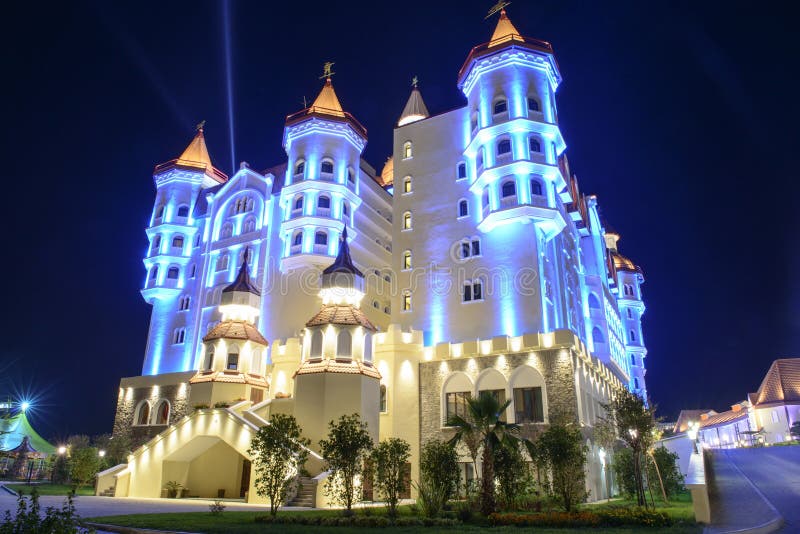 Illuminated magical building an amusement park in Adler