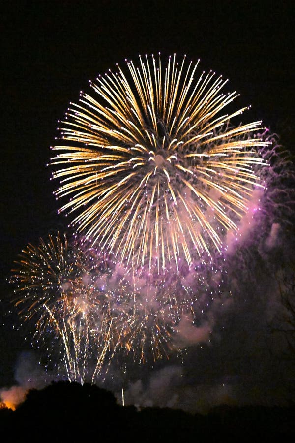 Colorful fireworks lights up the sky in this nighttime sky show royalty free stock photography