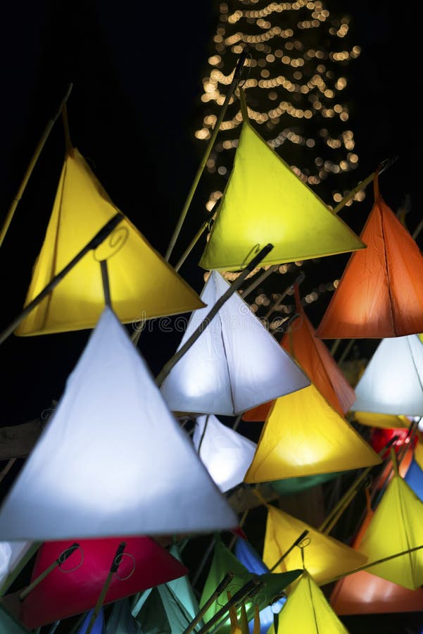 Illuminated PyramidShaped Paper Lanterns with Christmas Tree in Stock