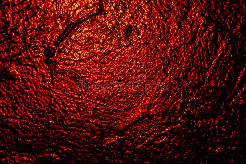 Illuminated in red black texture wall as a background royalty free stock photography