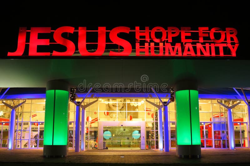 Hillsong church main entrance by night. Illuminated Hillsong Church main entrance of the Convention center in Sydney, Australia, by night with the sign: JESUS stock photos Hillsong church main entrance by night. Illuminated Hillsong Church main entrance of the Convention center in Sydney, Australia, by night with the sign: JESUS stock photos