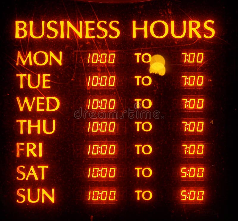 Illuminated Sign Of Operating Hours royalty free stock images Illuminated Sign Of Operating Hours royalty free stock images