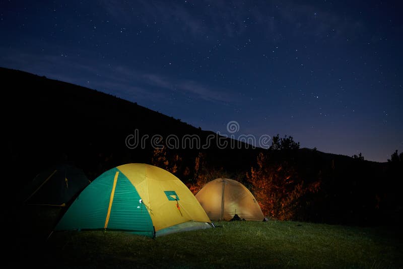 Illuminated Yellow Camping Tent Stock Image Image of light, clouds