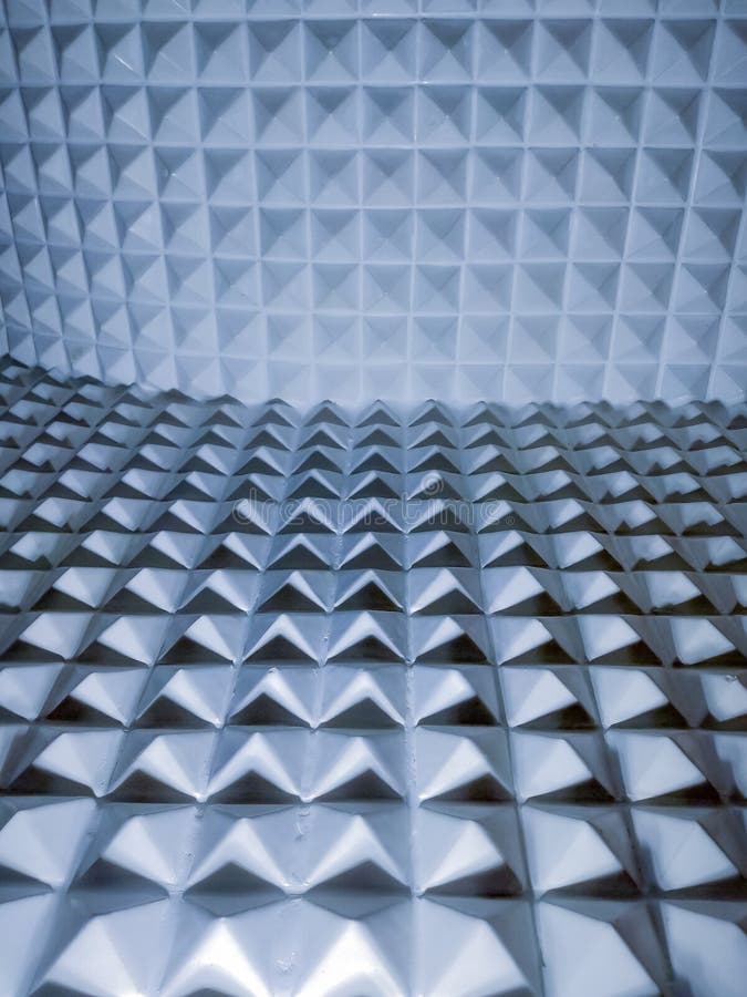 Illusion of sharp pyramidal plastic elements geometric textured and background royalty free stock image
