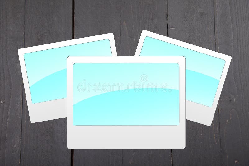 Illustration of empty blue photo frames on black wooden background royalty free stock image