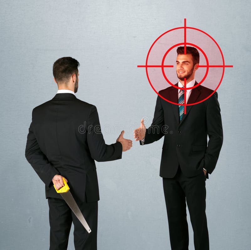 Ruthless businessman handshake with a hiding weapon and a head target point. Ruthless businessman handshake with a hiding weapon and a head target point
