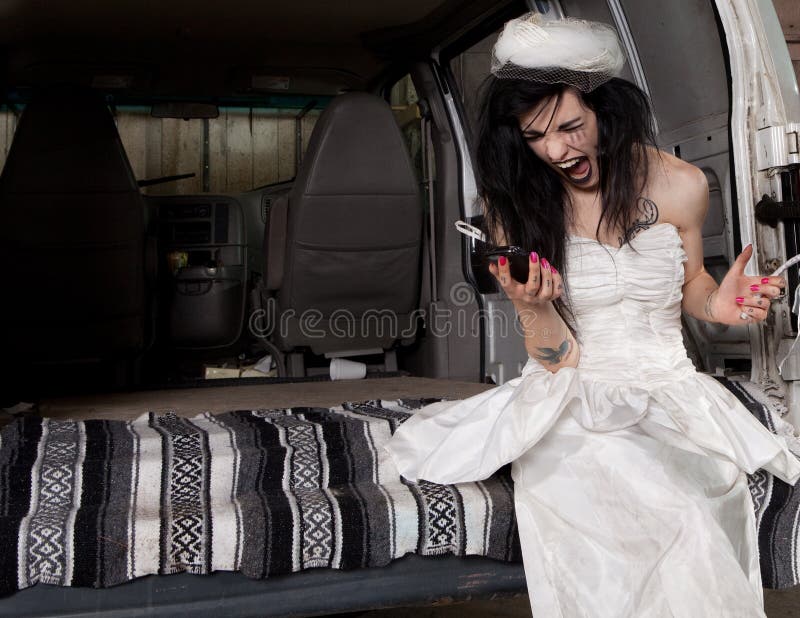 Stood up angry bride screaming at her phone. Stood up angry bride screaming at her phone