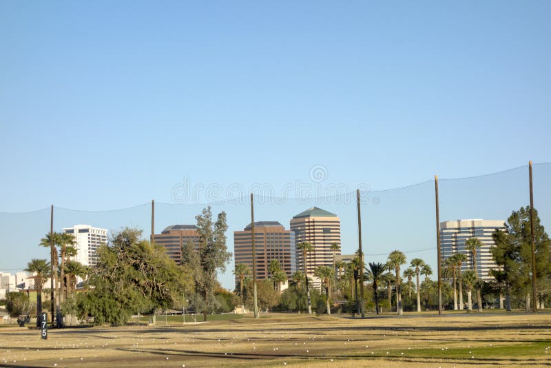 Golf course white balls spread all over grass in Encanto par, Phoenix downtown, Arizona in Winter. Golf course white balls spread all over grass in Encanto par, Phoenix downtown, Arizona in Winter.