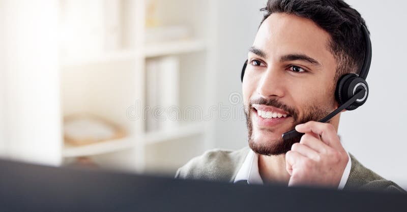 Handsome Male Call Center Worker in Headphones in the Offic at a ...