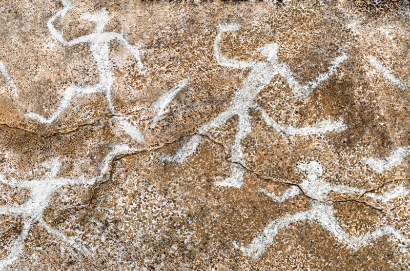 Image of ancient people on the wall of the cave. history. anthropology. archeology