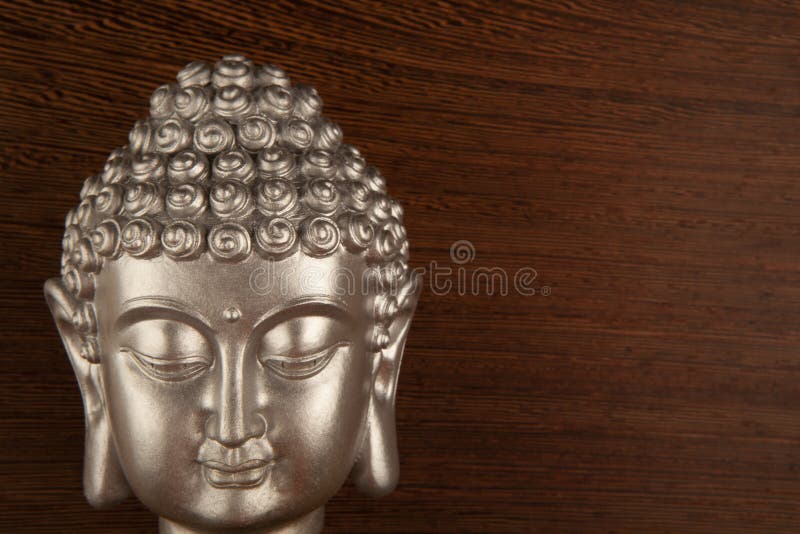 Image of buddha wooden background