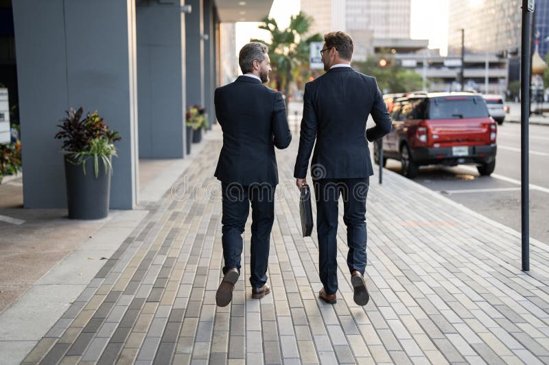 Image of Business Men Coworker Wearing Suit. Business Men Coworker Walk ...