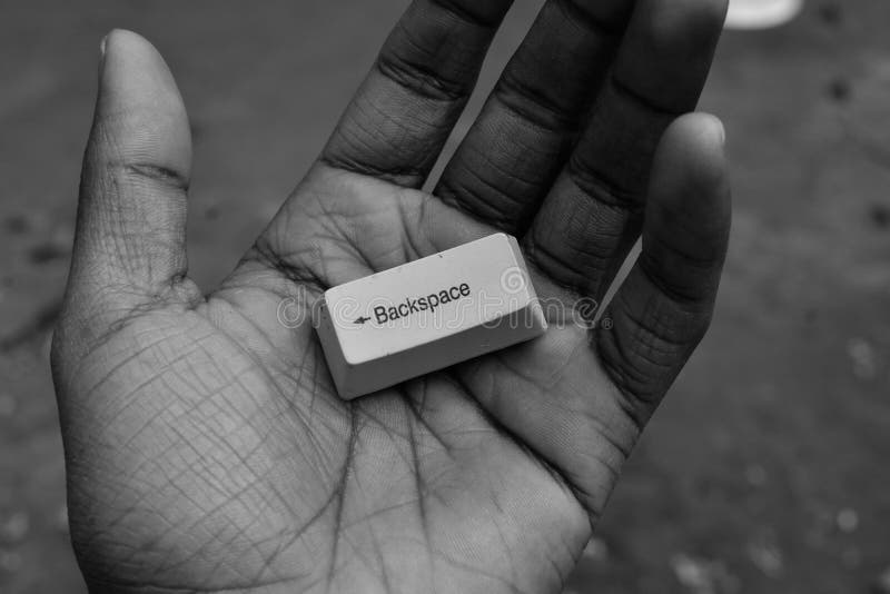 Life has no backspace key hand holding a backspace computer key royalty free stock photography Life has no backspace key hand holding a backspace computer key royalty free stock photography