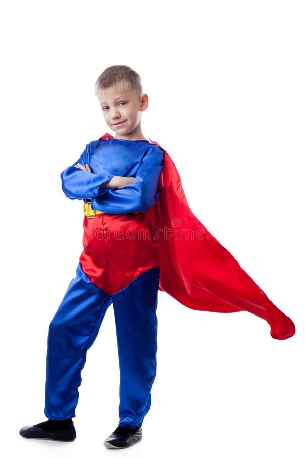 Image of cute boy posing in Superman costume stock image
