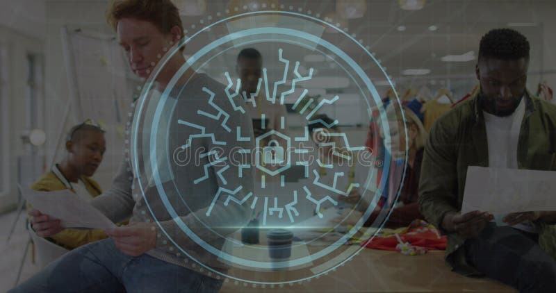 Image of cyber security text and lock icon over diverse fashion designers working in studio stock photography