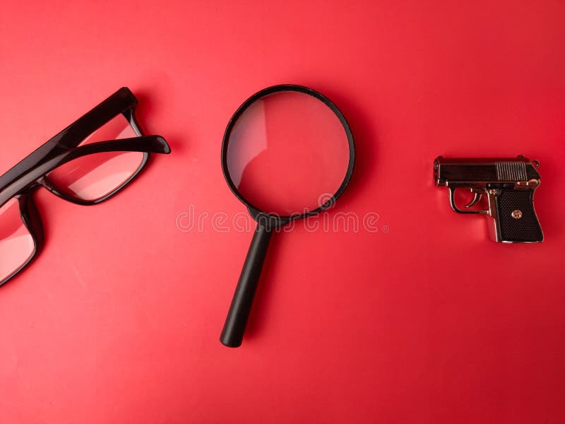 The image displays objects commonly associated with detective work or crime investigation. Detective paperwork stock images, royalty-free photos and pictures