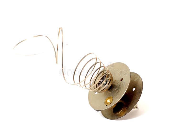 Image of a Dusty Vintage Clock Spring , on White Stock Photo Image of