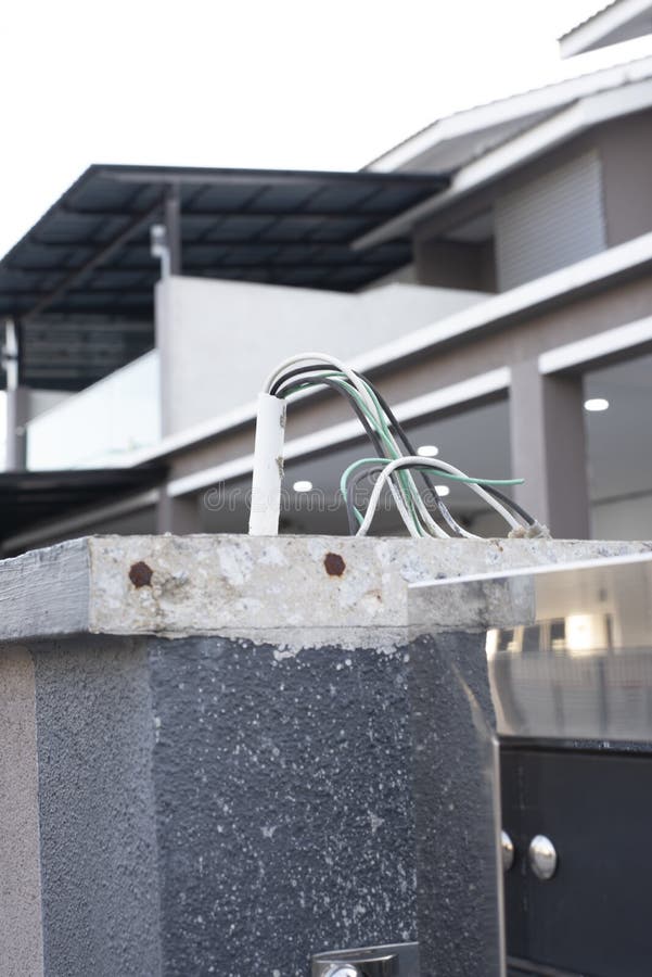 3 Electric Wires Laying Out from the Concrete Wall Stock Image Image