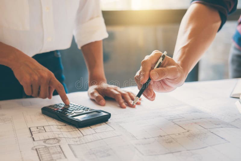 Image of Engineer or Architect Partner Meeting for Working with Stock