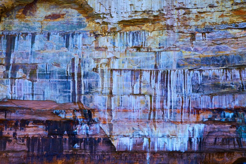 Flat Stone Walls of Pictured Rocks with White and Red Dripping Painted ...