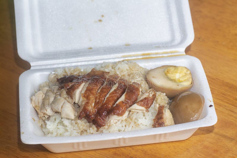 Grilled Chicken Meat Rice with Black Soy Sauce Egg on Polystyrene Box