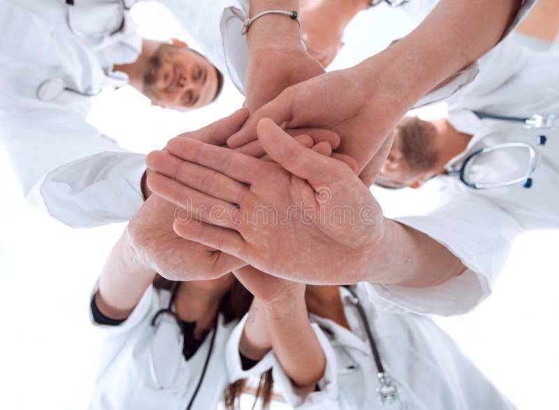 Group of Diverse Medical Staff Members Applauding Together Stock