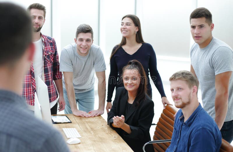 Image of a group of young professionals in the office royalty free stock image