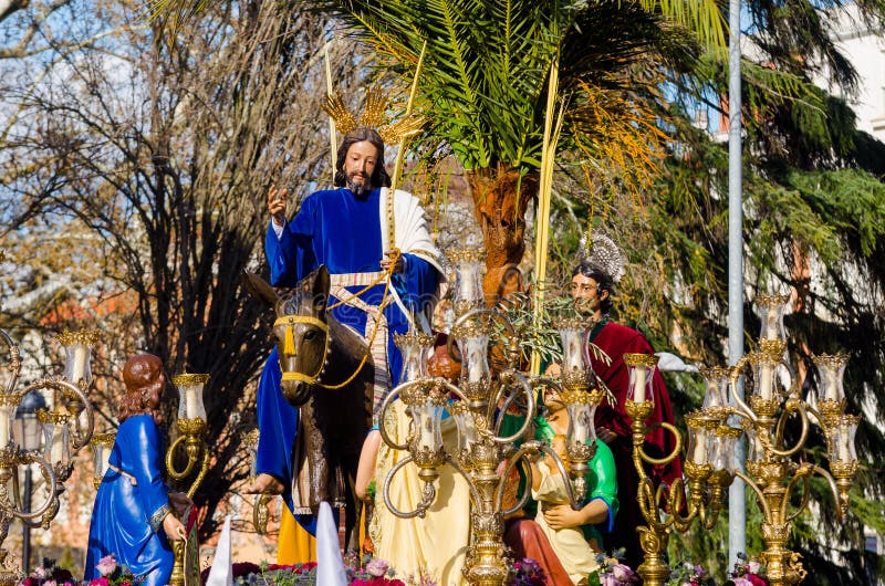 Jesus riding a donkey, during the celebration of Palm Sunday.