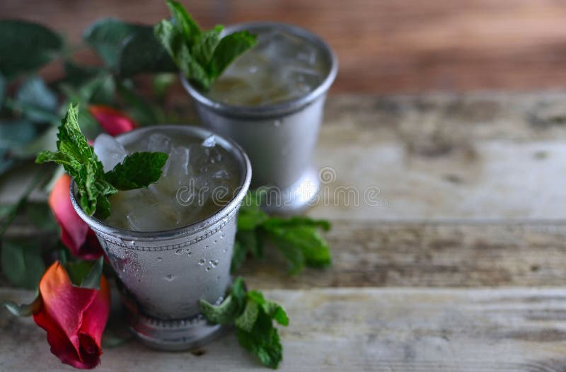 Image for Kentucky Derby in May Showing Two Silver Mint Julep Cups with