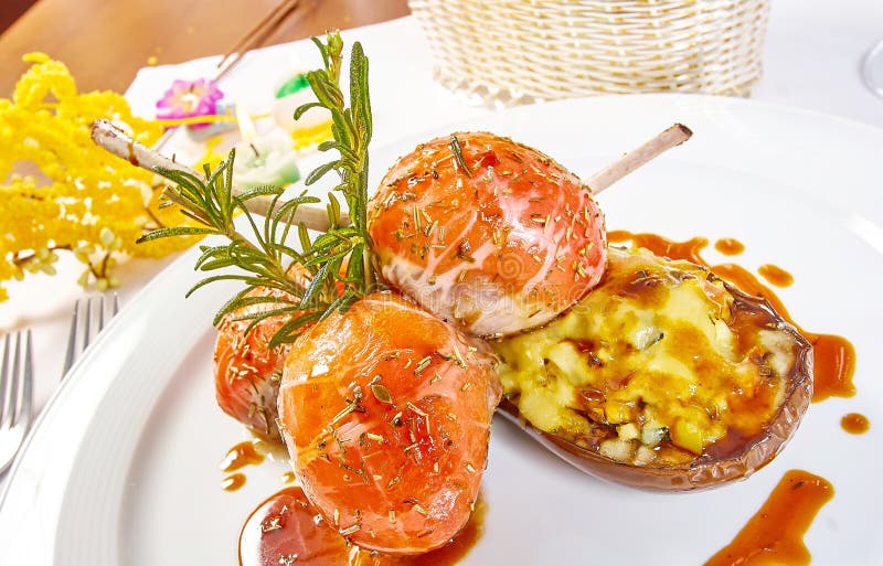 Image of Lamb Chops on a Bed of Vegetables Eggplant Stuffed with Vegetables Stock Photo Image