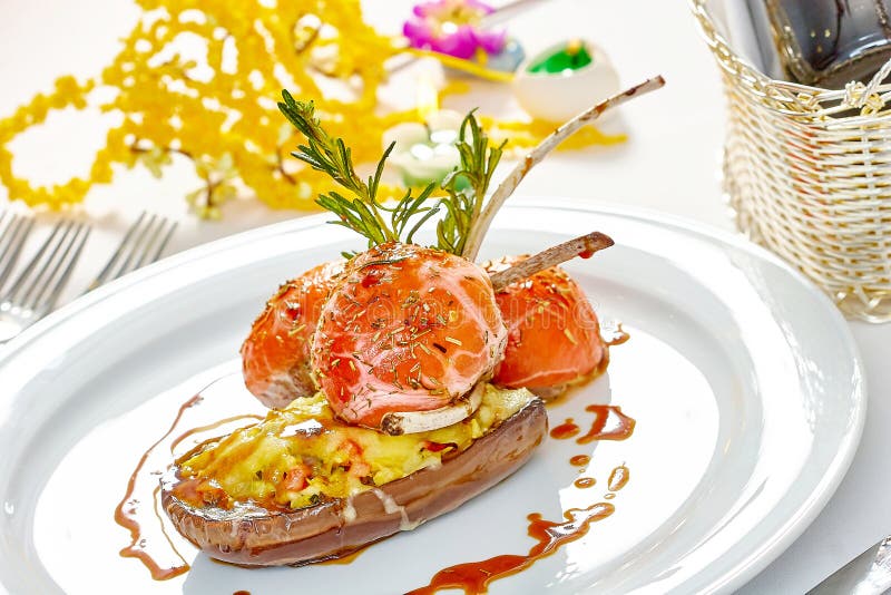 Image of Lamb Chops on a Bed of Vegetables Eggplant Stuffed with Vegetables Stock Photo Image