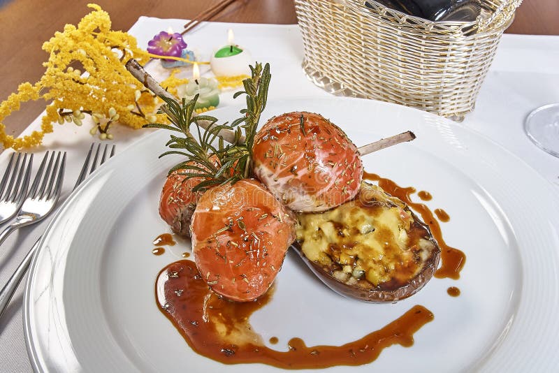 Image of Lamb Chops on a Bed of Vegetables Eggplant Stuffed with Vegetables Stock Photo Image