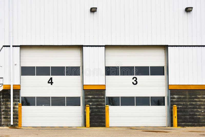 Large Industrial Bay Doors stock photo. Image of shipment 189045392