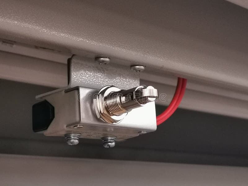 Image of Limit Switch Attached To Metal Door To Detect