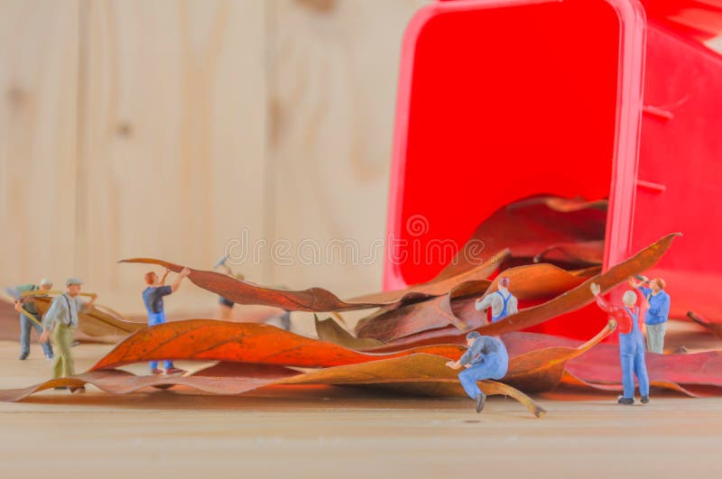 image of mini figure dolls worker collect dry leaves into the re royalty free stock images image of mini figure dolls worker collect dry leaves into the re royalty free stock images