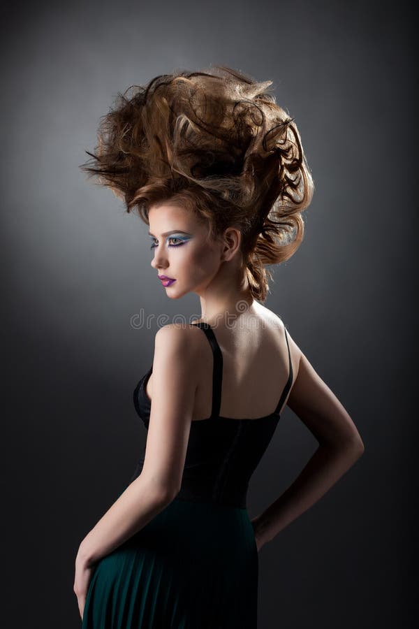 Image of model with volume hair and disco makeup