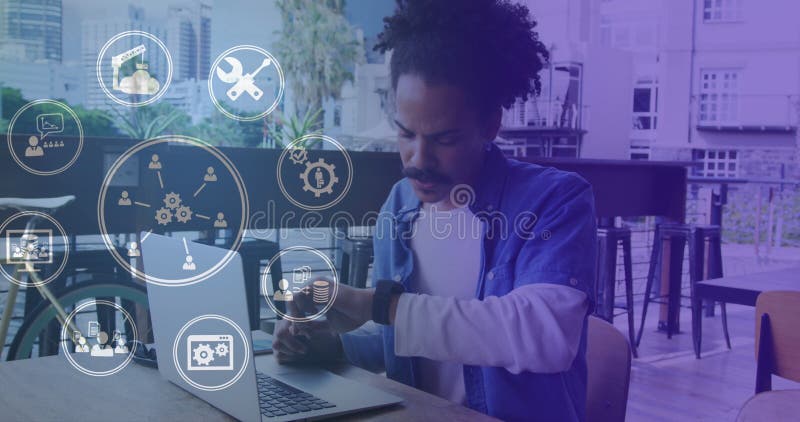 Image of network of connections with icons over man using laptop royalty free stock photography