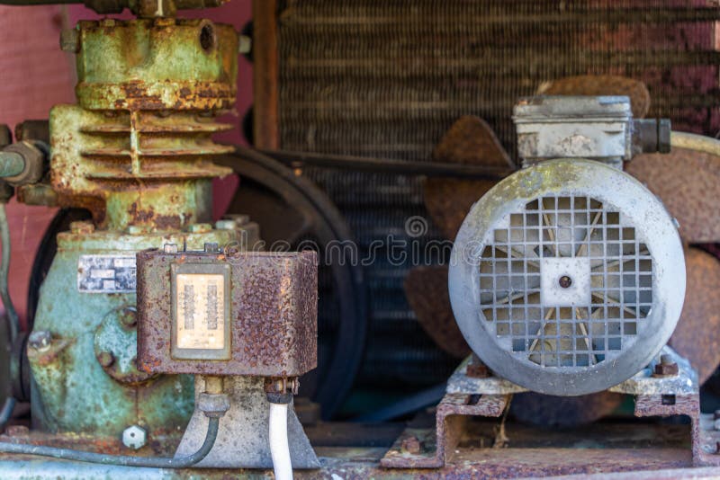 Old Rusty Abandoned Backhoe, Heavy Equipment, Amongst Trees with Rusty