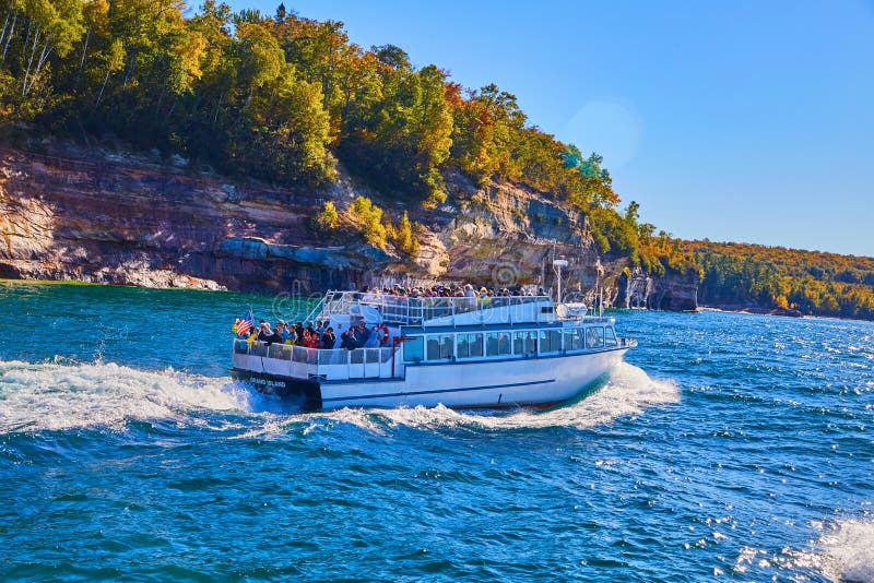 Pictured Rocks Boat Tour on Lake Michigan with Choppy Waves and Cliff