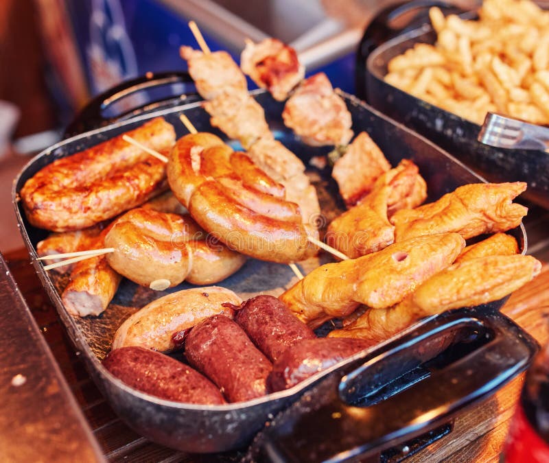 Image of Pork Sausages Cooking on a Flat Grill. Stock Photo Image of grilling, brown 104799210